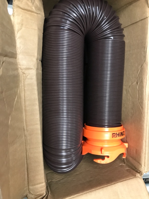 Photo 2 of **SEE NOTES**
Camco RhinoFLEX RV Sewer Hose Kit with Swivel Transparent Elbow and 4-in-1 Dump Station Fitting, Brown, 15 Feet (39770) 15ft Sewer Hose Kit Frustration-Free Packaging