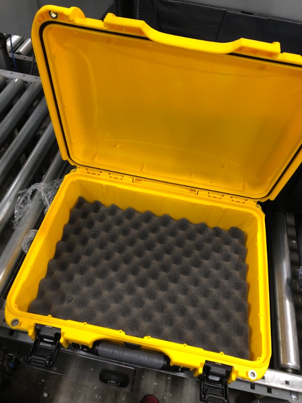 Photo 2 of Nanuk 935 Waterproof Carry-On Hard Case with Wheels and Foam Insert - Yellow & 910 Waterproof Hard Case with Foam Insert - Yellow Yellow Cubed Foam Case + 910 Case, Yellow