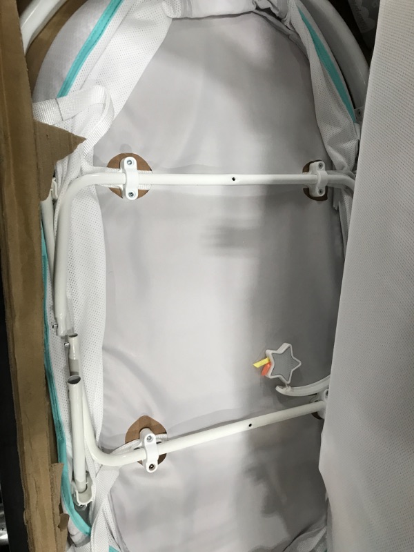 Photo 1 of Used *** Fisher-Price Soothing Motions Bassinet Windmill, Baby Cradle with sway Motion, Light Projection, Overhead Mobile, Vibrations and Music Windmill - Frustration Free Packaging