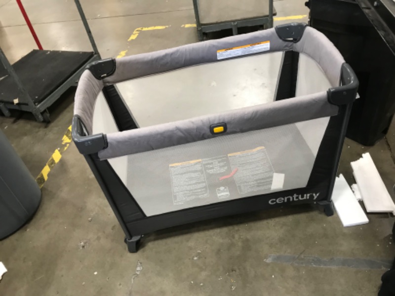 Photo 1 of CENTURY TRAVEL ON 2-IN-1 COMPACT PLAYARD WITH BASSINET, PLAYPEN WITH SHEET INCLUDED, METRO
