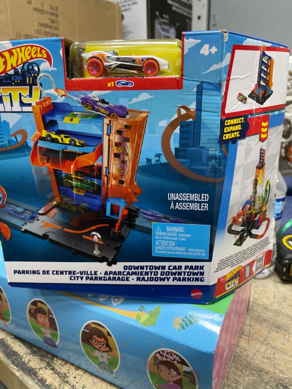 Photo 2 of Hot Wheels City Downtown Car Park Playset, with 1 Car, Connects to Other Tracks & Playsets, Gift for Kids Ages 4 to 8 Years Old