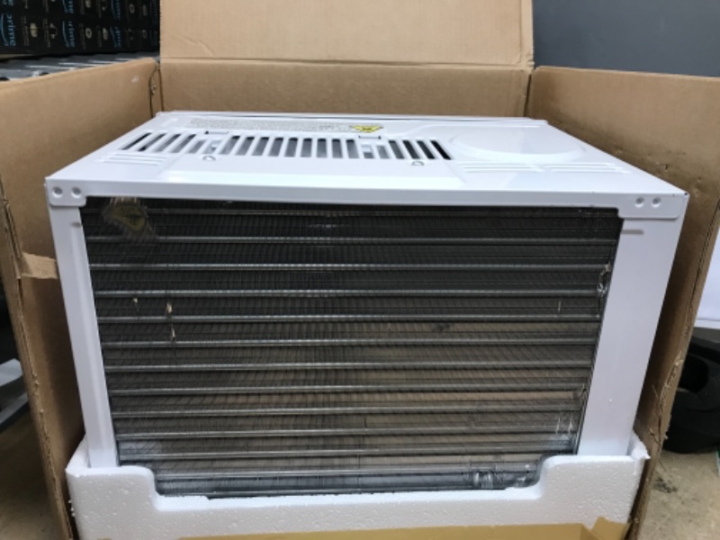 Photo 2 of *Missing Hardware* Amazon Basics Window-Mounted Air Conditioner with Mechanical Control - Cools 150 Square Feet, 5000 BTU, AC Unit