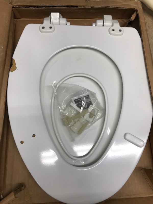 Photo 2 of *Major Damage-See Photos* MAYFAIR 1888SLOW 000 NextStep2 Toilet Seat with Built-In Potty Training Seat, Slow-Close, Removable that will Never Loosen, ELONGATED, White Elongated White