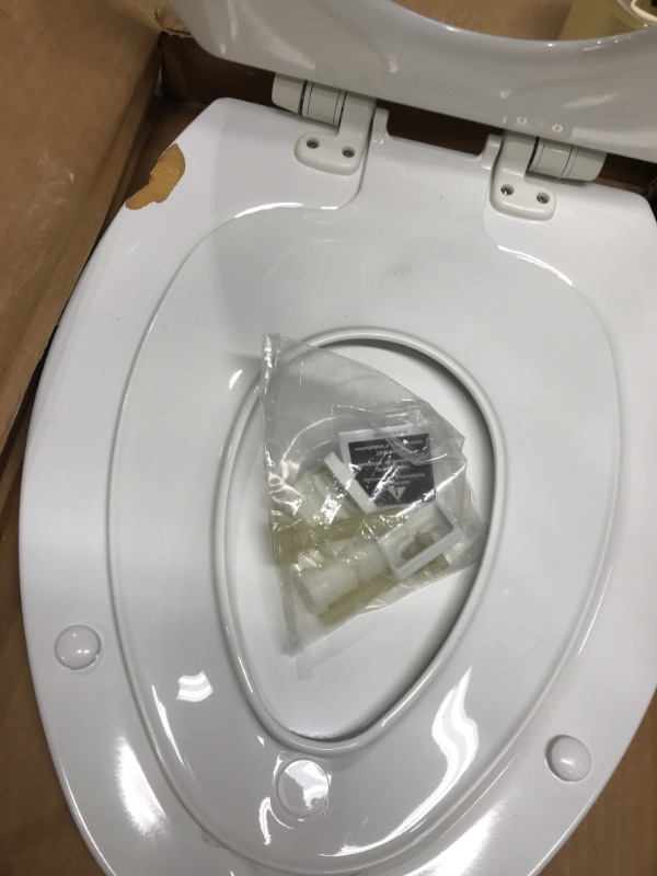 Photo 3 of *Major Damage-See Photos* MAYFAIR 1888SLOW 000 NextStep2 Toilet Seat with Built-In Potty Training Seat, Slow-Close, Removable that will Never Loosen, ELONGATED, White Elongated White
