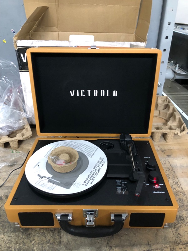 Photo 2 of Victrola Vintage 3-Speed Bluetooth Portable Suitcase Record Player with Built-in Speakers, Upgraded Turntable Audio Sound, Cognac Cognac Record Player