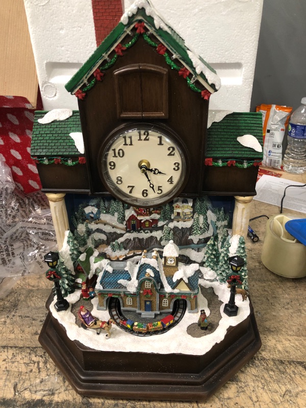 Photo 2 of Moments In Time Christmas Decor Cuckoo Clock with Christmas Village Scene, with LED Lights, Christmas Music, and Animation - Power Adapter (Included) (18.7" H x 12.2" W x 8.1" D)