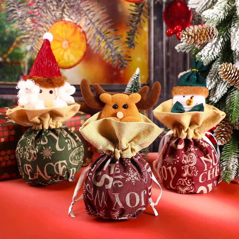 Photo 1 of **** PACK OF 2 ****
LEIFIDE 3 Pcs Christmas Doll Gift Bags Santa Gift Bag Christmas Candy Bags with Drawstring Reusable Apple Christmas Bags 3D Drawstring Gift Bags Cute Snowman Elk for Kids Xmas
