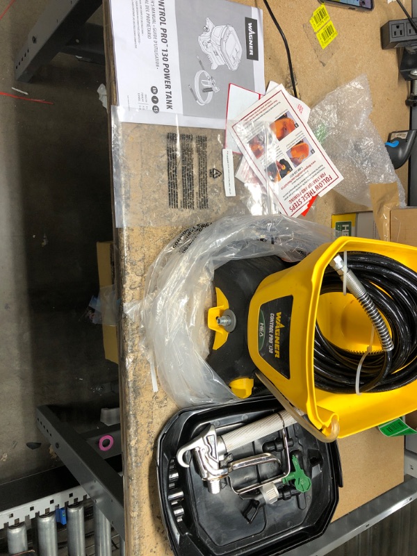 Photo 3 of **USED** Wagner 0580678 Control Pro 130 Power Tank Paint Sprayer, High Efficiency Airless with Low Overspray & 0580603 High Efficiency Airless 311 Reversible Spray Tip for Sealers 