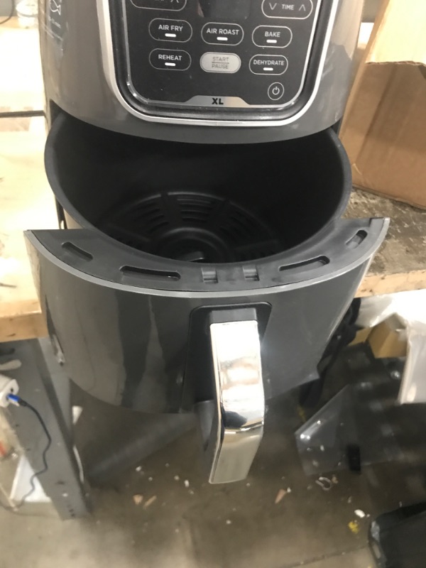 Photo 3 of Ninja AF150AMZ Air Fryer XL, 5.5 Qt. Capacity that can Air Fry, Air Roast, Bake, Reheat & Dehydrate, with Dishwasher Safe, Nonstick Basket & Crisper Plate and a Chef-Inspired Recipe Guide, Grey