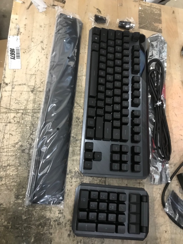 Photo 1 of **MISSING MOUSE PAD**
ASUS ROG Claymore II Wireless Modular Gaming Mechanical Keyboard & ROG Balteus Qi Vertical Gaming Mouse Pad with Wireless Qi Charging Zone, Hard Micro-Textured Gaming Surface (12.6” X 14.6”) ROG Claymore II (RX Blue Switches) Keyboar
