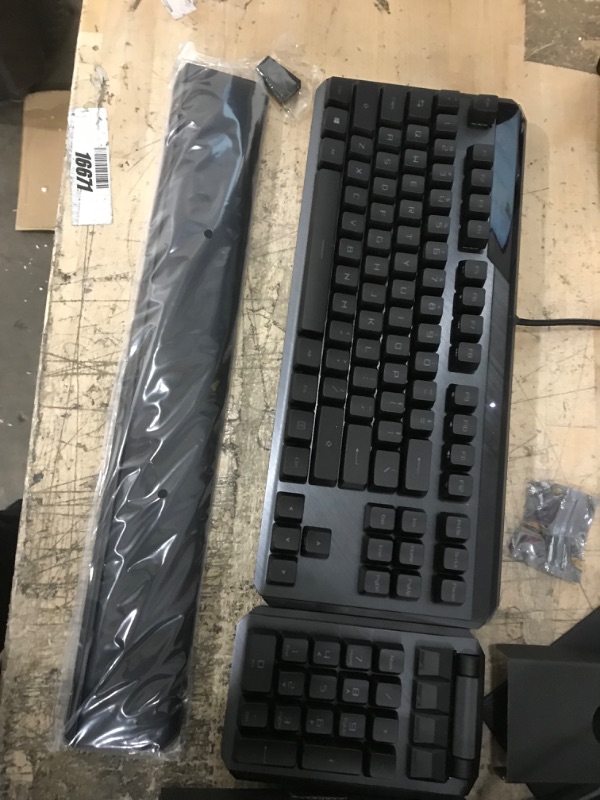 Photo 3 of **MISSING MOUSE PAD**
ASUS ROG Claymore II Wireless Modular Gaming Mechanical Keyboard & ROG Balteus Qi Vertical Gaming Mouse Pad with Wireless Qi Charging Zone, Hard Micro-Textured Gaming Surface (12.6” X 14.6”) ROG Claymore II (RX Blue Switches) Keyboar