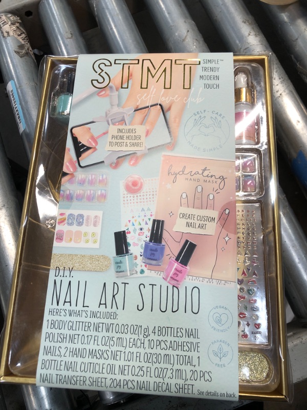 Photo 2 of STMT Self-Love Club D.I.Y. Nail Art Studio by Horizon Group USA, 10+ Essentials for at-Home Manicure Including Nail Polishes, Soothing Hand Mask, Cuticle Oil, Phone Holder, Nail Stickers & More