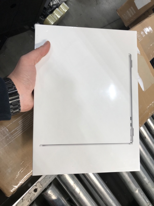 Photo 2 of New and sealed 
Apple 2022 MacBook Air Laptop with M2 chip: 13.6-inch Liquid Retina Display, 8GB RAM, 512GB SSD Storage, Backlit Keyboard, 1080p FaceTime HD Camera. Works with iPhone and iPad; Silver
