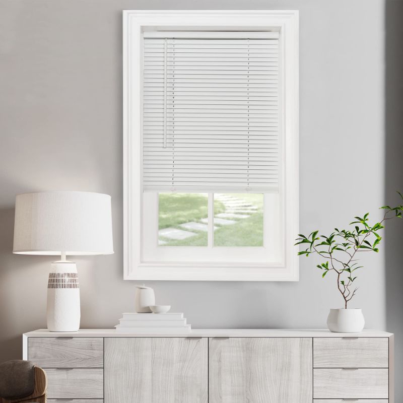 Photo 1 of ACHIM CORDLESS LIGHT FILTERING MINI BLINDS FOR WINDOWS, HORIZONTAL VINYL WINDOW BLINDS, SHADES FOR INDOOR WINDOWS, INSIDE MOUNT 1” GII MORNINGSTAR COLLECTION, PEARL WHITE, 29” W IN X 64” H 64”L X 29”W PEARL WHITE
