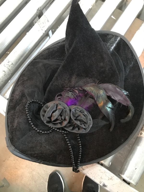 Photo 2 of Skeleteen Deluxe Pointed Witch Hat - Glamorous Black Witches Accessories Fancy Velvet Hat with Flowers, Beads and Purple Feathers