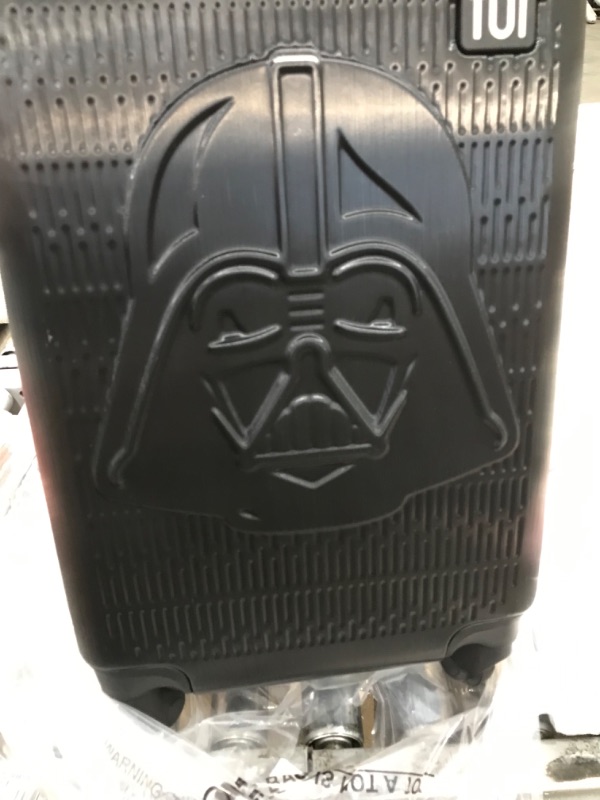 Photo 4 of **SCRATCHED UP FROM NORMAL WARE, SEE PHOTOS**
FUL Star Wars Darth Vader 22 Inch Rolling Luggage, Embossed Hardshell Carry On Suitcase with Wheels, Black