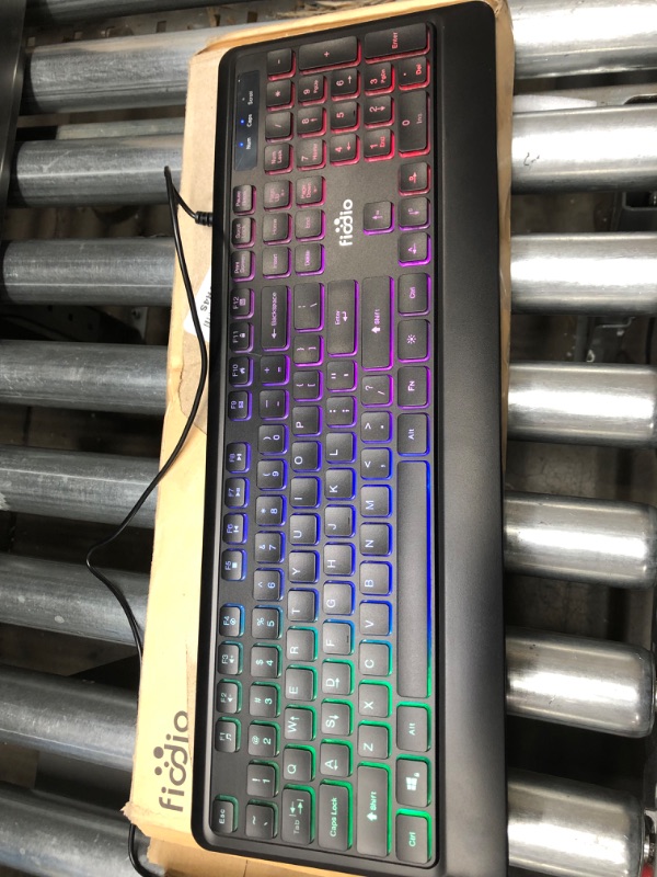 Photo 2 of Fiodio Rainbow Membrane Gaming Keyboard, Quiet Wired Computer Keyboard, 104 Silent & 26 Anti-Ghosting Keys, Spill Resistant, Multimedia Control for PC and Desktop