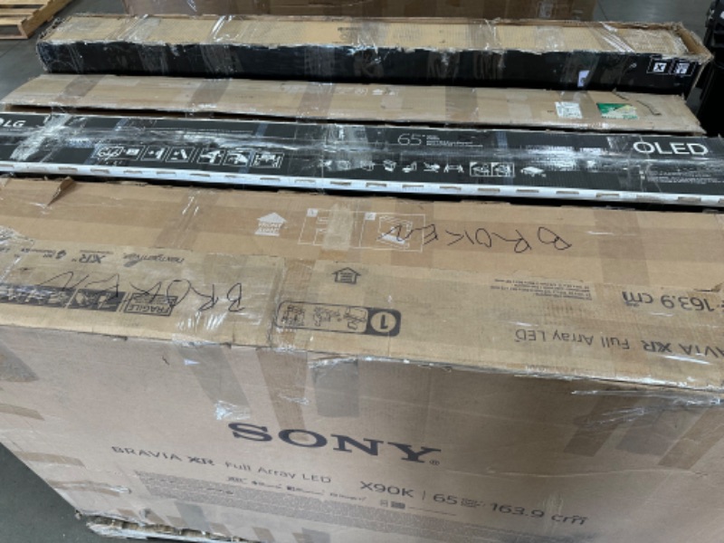 Photo 1 of **PALLET OF 5 BROKEN TVS AND MONITORS**