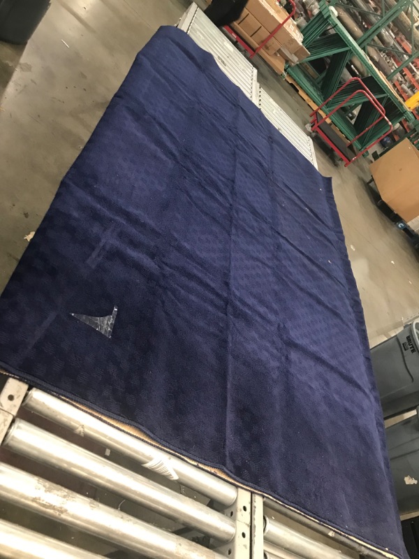 Photo 1 of **used-dirty**
7'6" x 8 blue rug , view photos