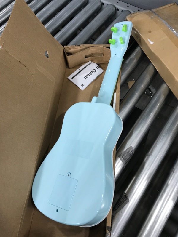 Photo 3 of CoComelon Musical Guitar by First Act, 23.5” Kids Guitar - Plays Clips of The ‘Finger Family’ Song - Musical Instruments for Kids, Toddlers, and Preschoolers