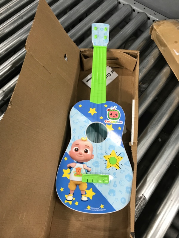 Photo 2 of CoComelon Musical Guitar by First Act, 23.5” Kids Guitar - Plays Clips of The ‘Finger Family’ Song - Musical Instruments for Kids, Toddlers, and Preschoolers