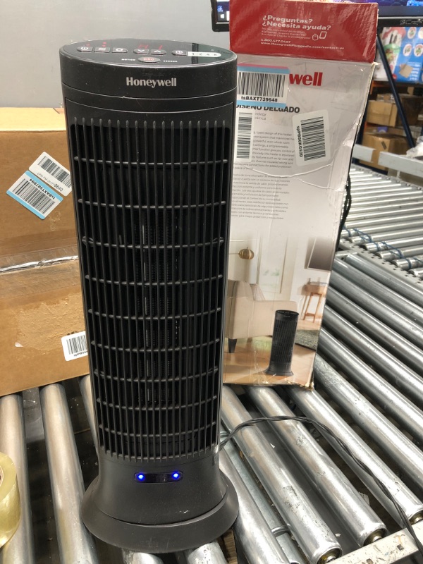 Photo 2 of *** POWERS ON *** Honeywell  Digital Ceramic Tower Heater, 1500 Watt, Black – Oscillating Ceramic Heater – Space Heater with Two Heat Settings Medium Room Heater
