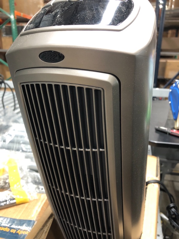 Photo 2 of ****FOR PARTS DOES NOT TURN ON****Lasko Oscillating Digital Ceramic Tower Heater for Home with Adjustable Thermostat, Timer and Remote Control, 23 Inches, 1500W, Silver, 755320