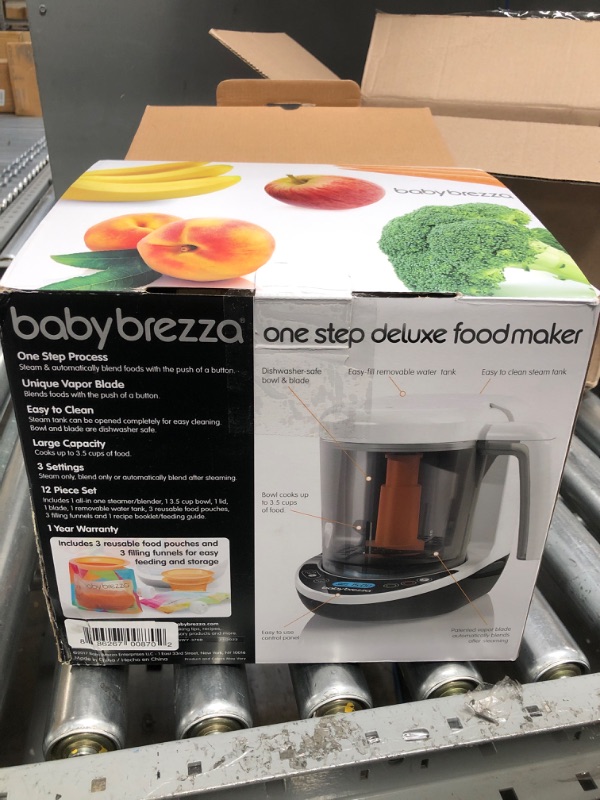 Photo 2 of Baby Brezza One Step Baby Food Maker Deluxe – Cooker and Blender in One to Steam and Puree Baby Food for Pouches - Make Organic Food for Infants and Toddlers - Set Includes 3 Pouches and 3 Funnels