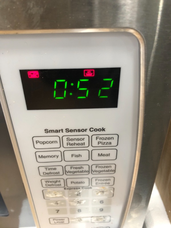 Photo 4 of ****FOR PARTS ONLY TURNS ON BUT DOES NOT WORK*** Farberware Countertop Microwave Oven 1.3 Cu. Ft. 1100-Watt with Smart Sensor Cooking, ECO Mode and Green LED Lighting, Child Lock, Easy Clean Black Interior, Retro White and Platinum Copper