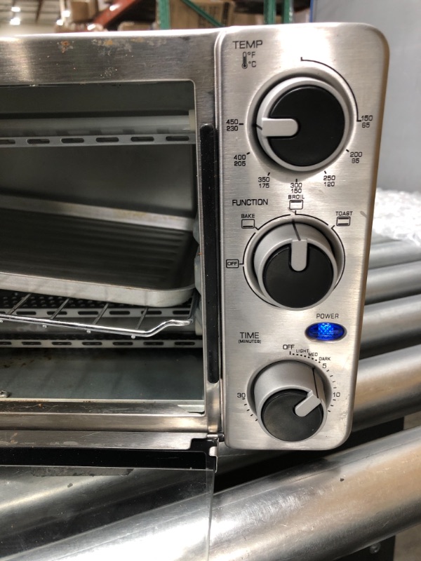 Photo 2 of *Tested/Door Doesn't Close Shut-See Photos* Toaster Oven 4 Slice, Multi-function Stainless Steel Finish with Timer - Toast - Bake - Broil Settings, Natural Convection - 1100 Watts of Power, Includes Baking Pan and Rack by Mueller Austria
