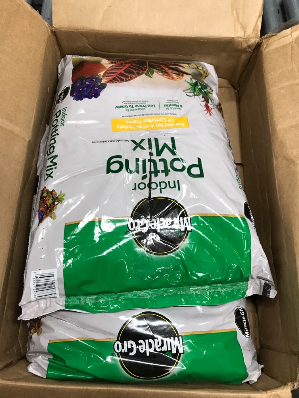 Photo 2 of *One bag damaged-See photos* Miracle-Gro Indoor Potting Mix - Blended for a Wide Variety of Container Plants, 16 qt. (2-Pack)
