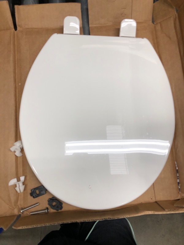 Photo 2 of *Loose Hardware-See Photos* Kohler 4775-0 Brevia Round Toilet Seat with Grip Tight Bumpers, Release, Quick Attach Hardware, Color Matched Hinges, White Round White