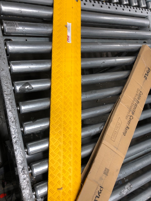 Photo 2 of Durable Cable Protection Ramp Cover Supports 11000lbs Single Channel Heavy Duty Hose & Cord Track Floor Protection,39.4”x5.11”x0.78” Cable Concealer for Indoor Outdoor Use-Pyle PCBLCO101 Yellow/Single