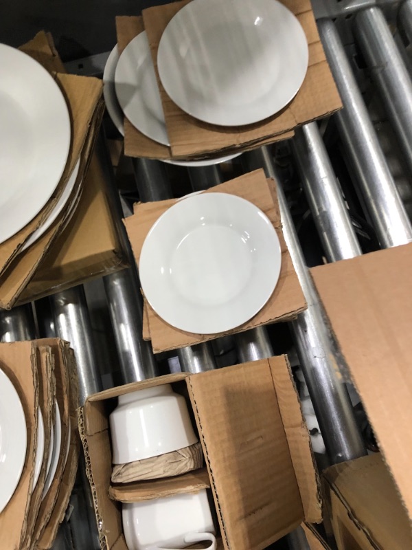 Photo 1 of **unknown count**
White Ceramic Dish Set 