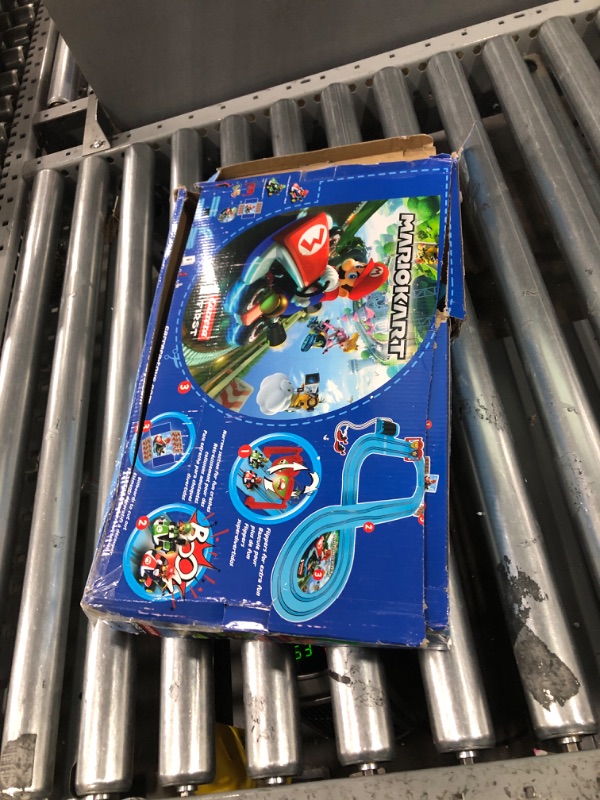 Photo 3 of Carrera First Nintendo Mario Kart Slot Car Race Track - Includes 2 Cars: Mario and Luigi and Two-Controllers - Battery-Powered Beginner Set for Kids Ages 3 Years and Up, 20063028 Mario Kart / Flippers