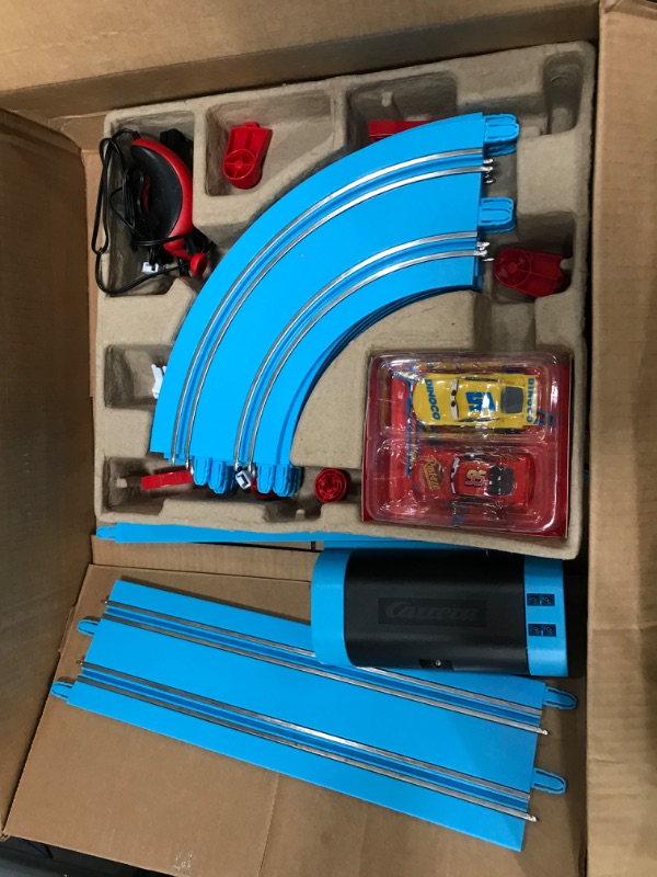 Photo 2 of Carrera First Disney/Pixar Cars - Slot Car Race Track - Includes 2 Cars: Lightning McQueen and Dinoco Cruz - Battery-Powered Beginner Racing Set for Kids Ages 3 Years and Up Disney Cars w/ Spinners