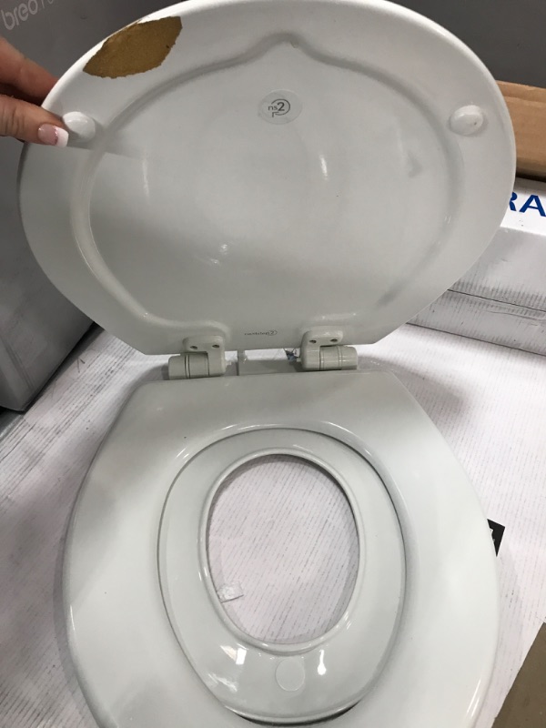 Photo 4 of *DAMAGED* MAYFAIR 888SLOW 000 NextStep2 Toilet Seat with Built-In Potty Training Seat, Slow-Close, Removable that will Never Loosen, ROUND, White Round White