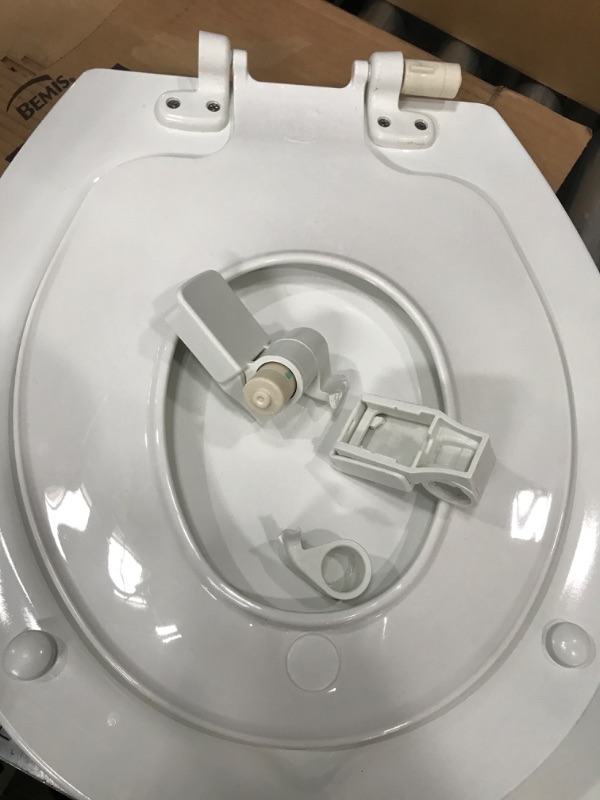 Photo 2 of *DAMAGED* MAYFAIR 888SLOW 000 NextStep2 Toilet Seat with Built-In Potty Training Seat, Slow-Close, Removable that will Never Loosen, ROUND, White Round White