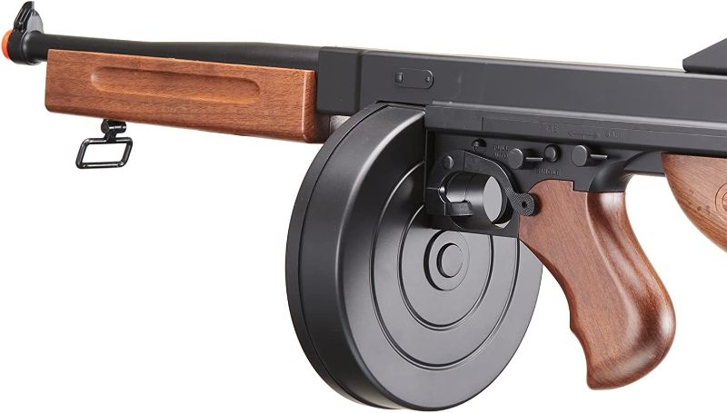 Photo 1 of Airsoft Tommy Thompson Submachine Gun WW2 Chicago Typewriter Full Auto Electric SMG AEG with Extra Drum Magazines, Battery and Charger- Color Faux Wood
