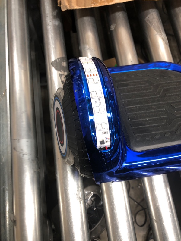 Photo 3 of -USED FOR PARTS-
TPS Power Sports Electric Hoverboard Self Balancing Scooter for Kids and Adults Hover Board with 6.5" Wheels Built-in Bluetooth Speaker Bright LED Lights UL2272 Certified Chrome Blue