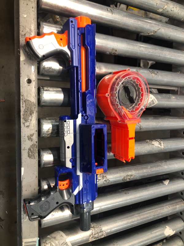 Photo 2 of ****Item missing nerf darts****
Nerf Rampage N-Strike Elite Toy Blaster with 25 Dart Drum Slam Fire & 25 Official Elite Foam Darts for Kids, Teens, & Adults (Amazon Exclusive) 