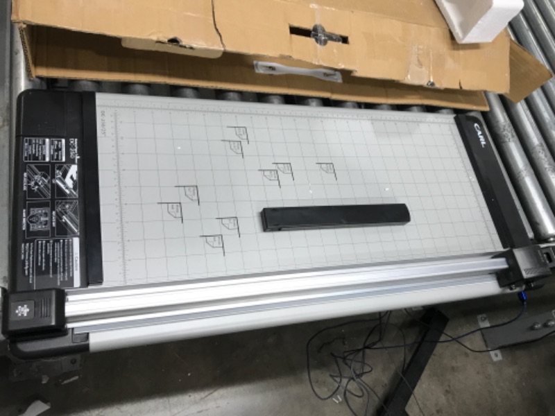 Photo 1 of CARL Heavy Duty Rotary Paper Trimmer 25 inch. - 12250 25-Inch