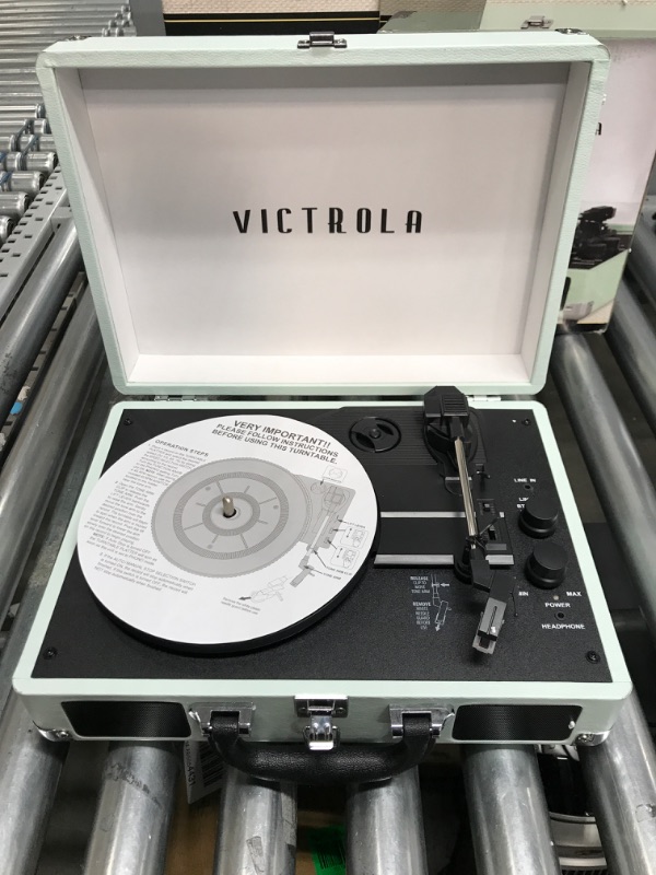 Photo 3 of -USED FOR PARTS-
Victrola Vintage 3-Speed Bluetooth Portable Suitcase Record Player with Built-in Speakers | Upgraded Turntable Audio Sound| Includes Extra Stylus | Mint (VSC-550BT-HOM)
