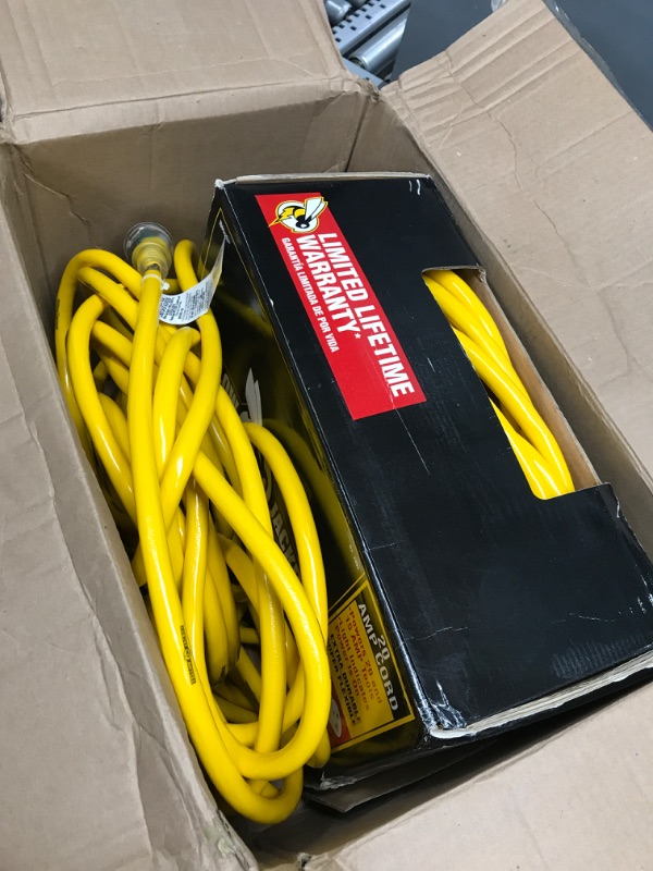 Photo 2 of ***UNABLE TO TEST***  Yellow Jacket 2992 10/3 Extra Heavy-Duty 20-Amp Premium SJTW Contractor Extension Cord with Lighted T-Blade Plug, 100-Foot All Copper Wire Extension Cord, 20 Amps, 125 Volts, 2500 Watts, Yellow 100 ft