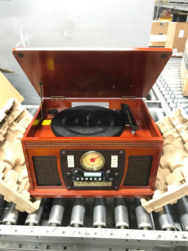 Photo 2 of Victrola 8-in-1 Bluetooth Record Player & Multimedia Center, Built-in Stereo Speakers - Turntable, Wireless Music Streaming, Real Wood | Mahogany
*TURNS ON*
