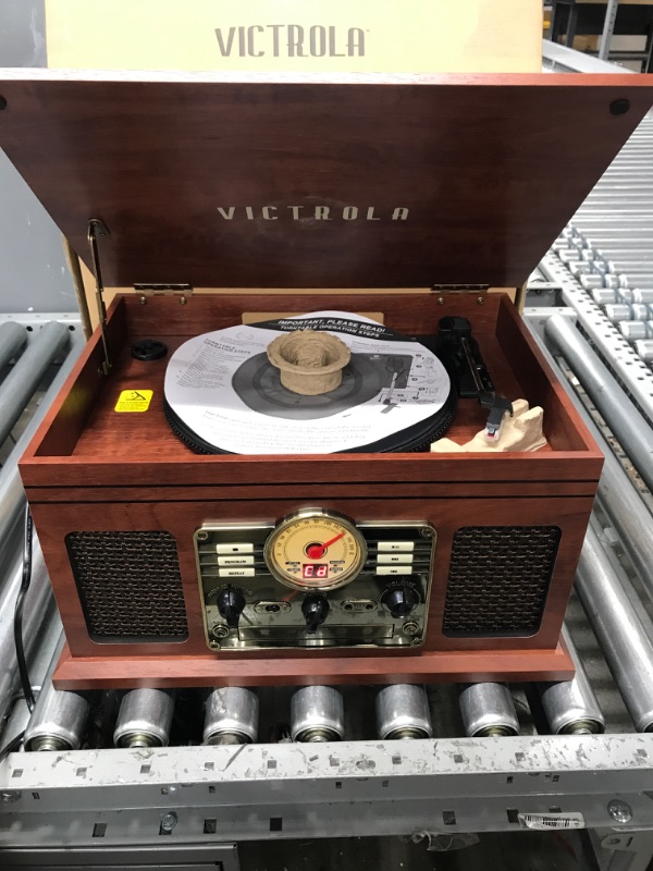 Photo 2 of ***PARTS ONLY*** Victrola Nostalgic 6-in-1 Bluetooth Record Player & Multimedia Center with Built-in Speakers - 3-Speed Turntable, CD & Cassette Player, FM Radio | Wireless Music Streaming | Mahogany TURNS ON***
