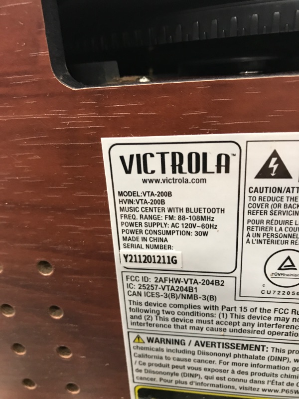 Photo 3 of ***PARTS ONLY*** Victrola Nostalgic 6-in-1 Bluetooth Record Player & Multimedia Center with Built-in Speakers - 3-Speed Turntable, CD & Cassette Player, FM Radio | Wireless Music Streaming | Mahogany TURNS ON***
