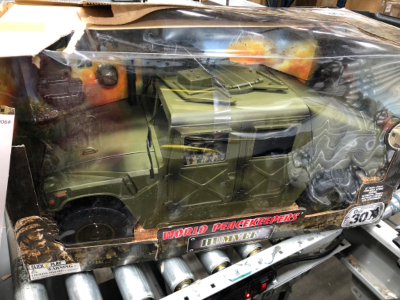 Photo 1 of Click N Play Military Jumbo 12 Inch Long Humvee Vehicle Action Figure Play Set with Accessories.
