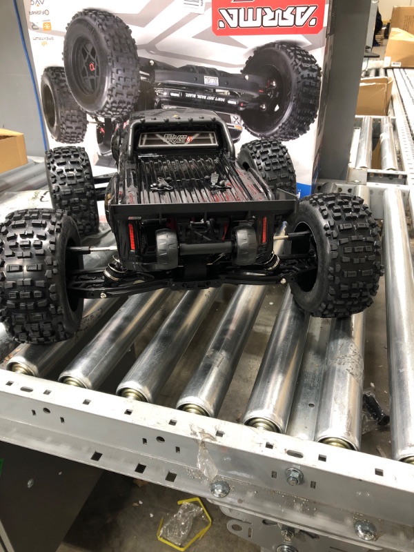 Photo 5 of ARRMA RC Truck 1/8 Outcast 6S BLX 4WD Extreme Bash Stunt Truck RTR (Battery and Charger Not Included), Black, ARA8710