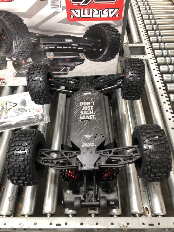 Photo 6 of ARRMA RC Truck 1/8 Outcast 6S BLX 4WD Extreme Bash Stunt Truck RTR (Battery and Charger Not Included), Black, ARA8710